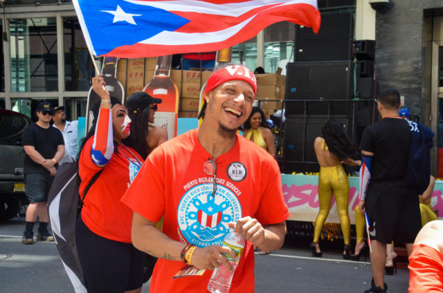 One Particularly Joyful Marcher Gears Up for the Parade to Start